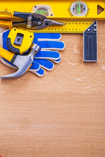 Variation of construction tools on wooden brown board maintenance concept