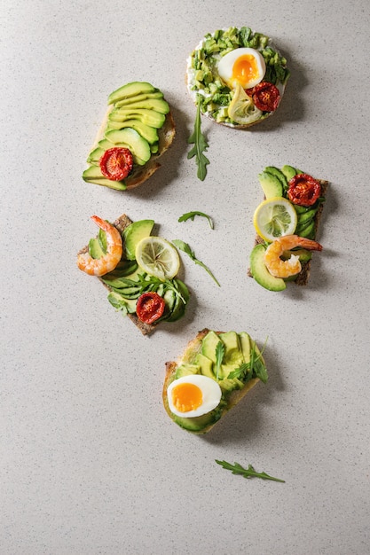 Variety of avocado sandwiches