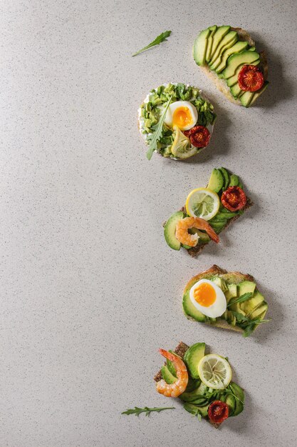 Variety of avocado sandwiches