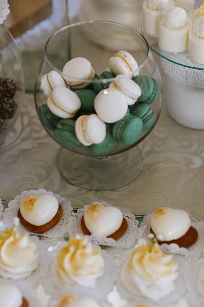 Variety of candies, cakes and cupcakes at the candy bar