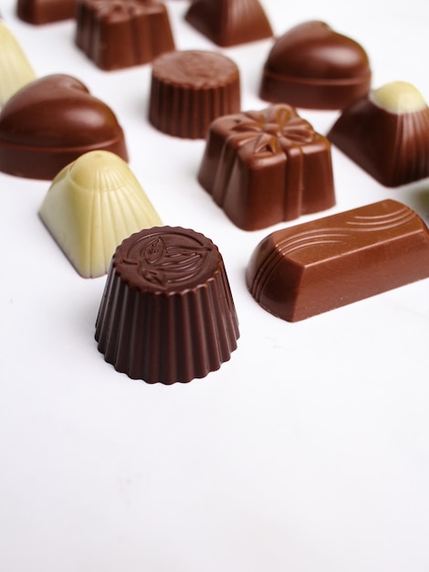 Variety of chocolates isolated on white background