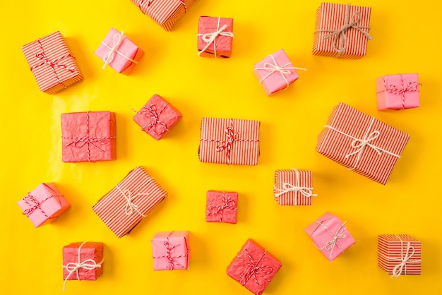 Variety of christmas gifts on a yellow background