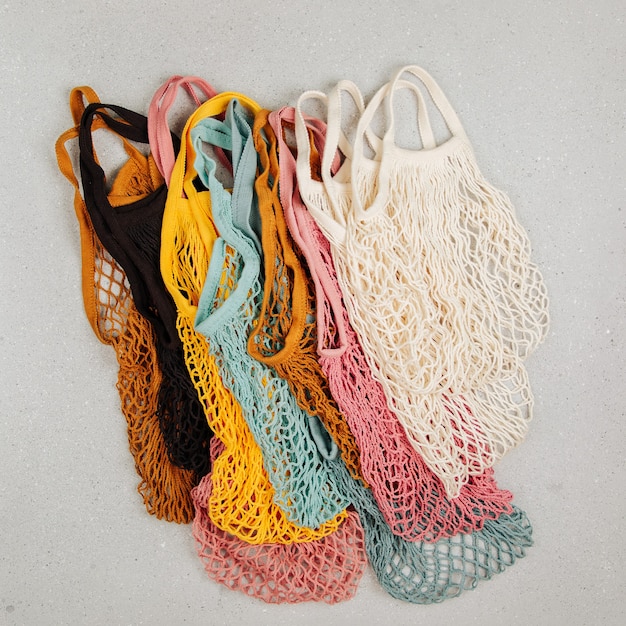 A variety of colorful reusable shopping bags. zero waste concept. no plastic. eco friendly mesh bags.