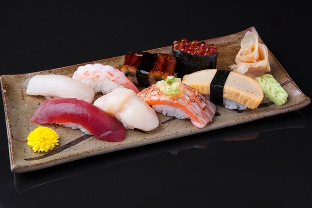 Variety of delicious sushi on a plate