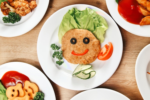 Variety of dishes on the table in childrens restaura