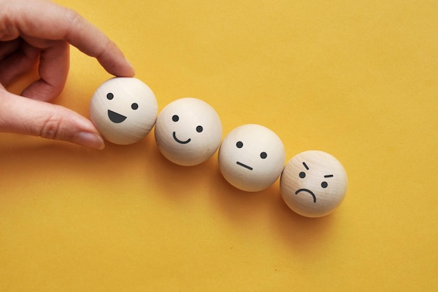 A variety of emotions: joy, serenity, anger, sadness wooden balls