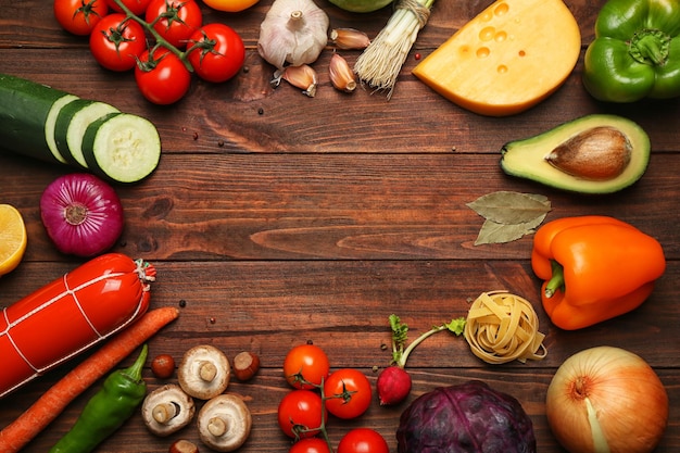 Variety of food products on wooden background