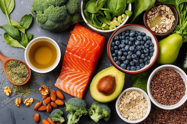 a variety of foods including broccoli beans and rice are on a table