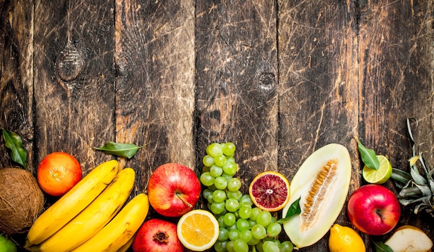 Variety of fresh fruits on a wooden table