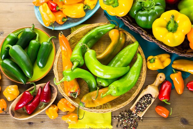 Variety of fresh organic peppers on the table.