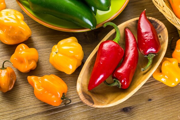 Variety of fresh organic peppers on the table.