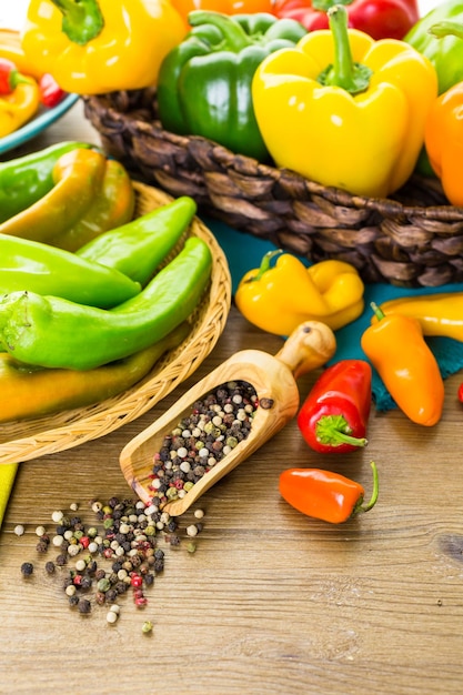 Variety of fresh organic peppers on the table