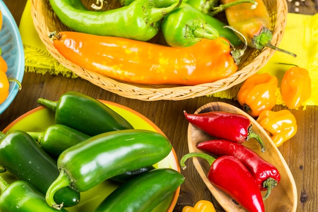 Variety of fresh organic peppers on the table.