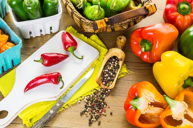 Variety of fresh organic peppers on the table.