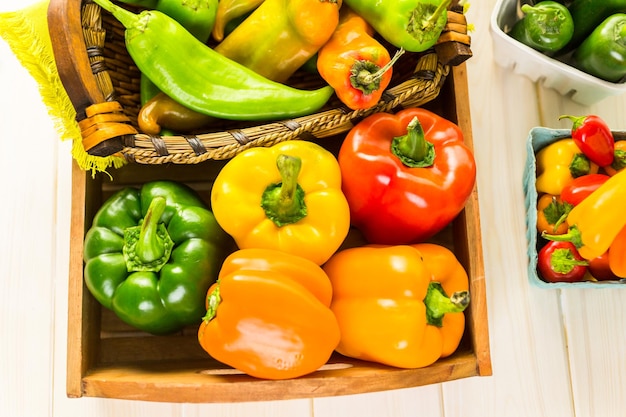 Variety of fresh organic peppers on the table.