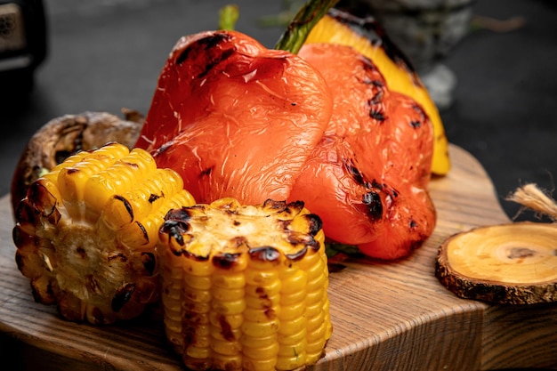 A variety of grilled vegetables bell pepper corn mushrooms