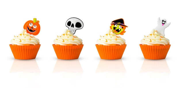 Variety of Halloween cupcakes isolated on white background
