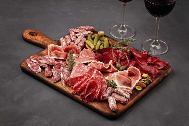 Variety of meat on a wooden board