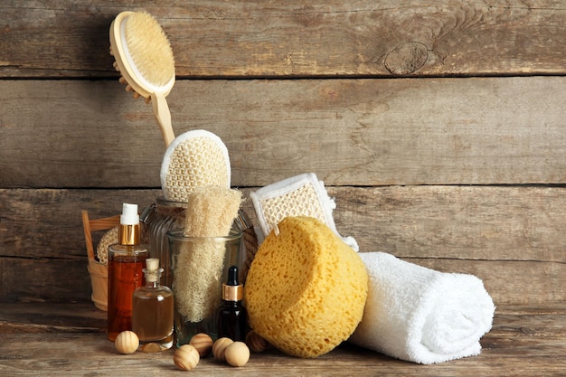 Variety of natural bath tools on wooden background