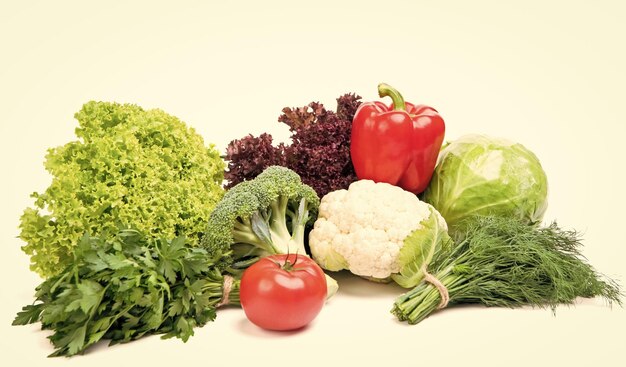 사진 variety of organic vegetables cabbages bell pepper and leafy greens isolated on white