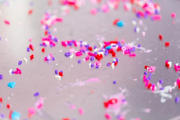 Variety of pink sprinkles for decorating Valentine's day cookies.