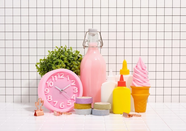 Variety of school colorful supplies on desktop Creative workspace and delicious ice cream with juice