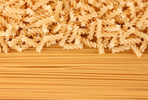 Variety of types and shapes of dry Italian pasta