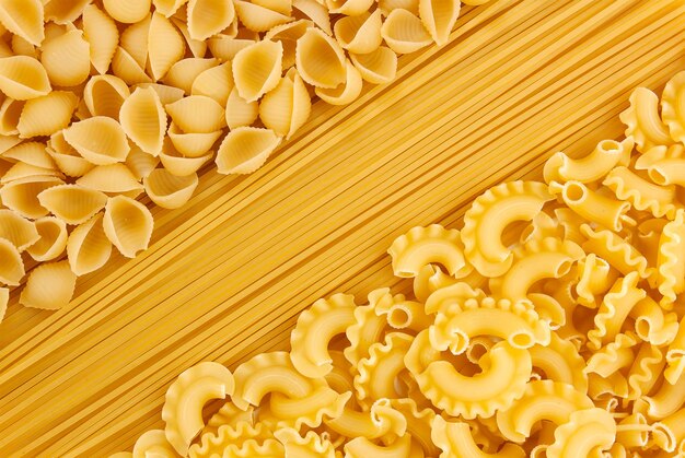 Variety of types and shapes of dry Italian pasta