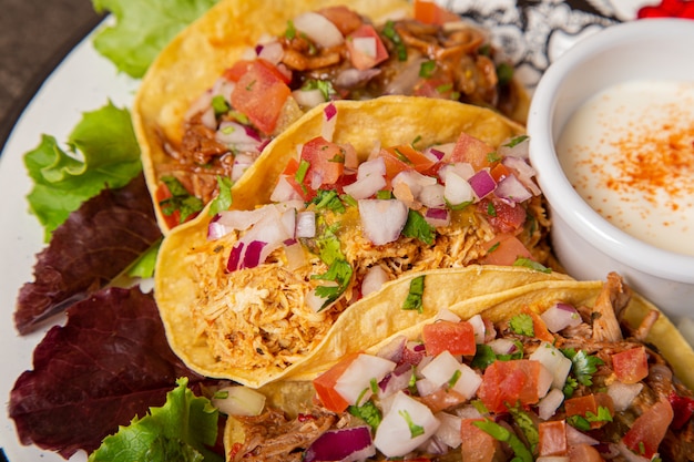 Variety of typical Mexican meat tacos. Isolated image