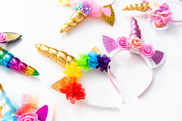 Variety of unicorn headbands on a white background.