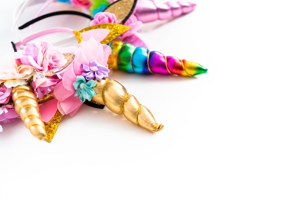 Variety of unicorn headbands on a white background.