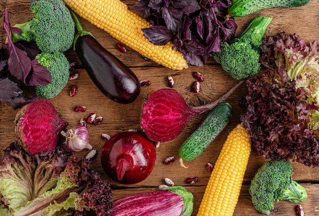 Variety of vegetables on wooden rustic table.