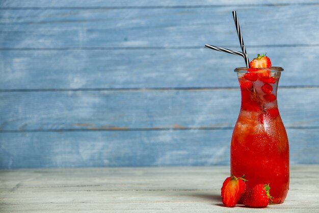 Various alcoholic cocktails on white background