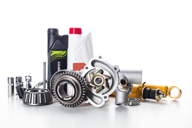 various automotive components and tools arranged on a white background for garage use and maintenance tasks