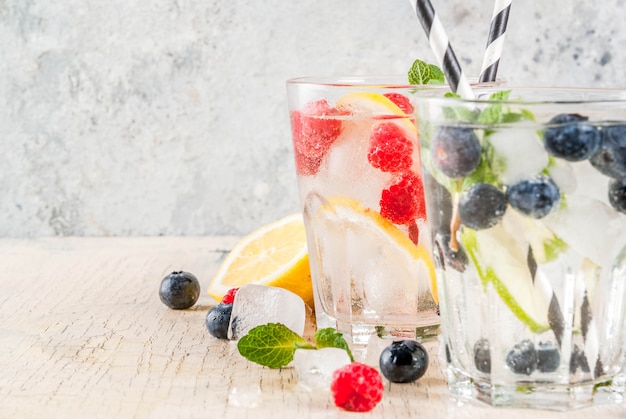 Various berry lemonade with trays