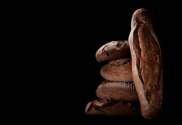 Various bread in dark studio