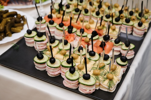 Various canapes for snacks on the festive table
