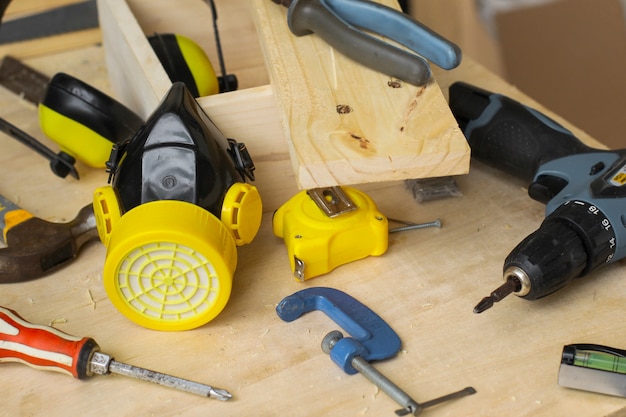 Various carpenter tools on workshop table