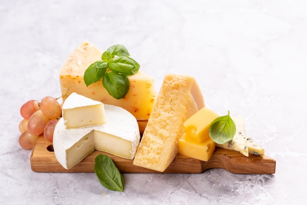 Various cheese on board