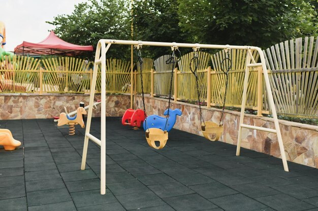 Various Children's toys on the playground Swing carousel in the park for children