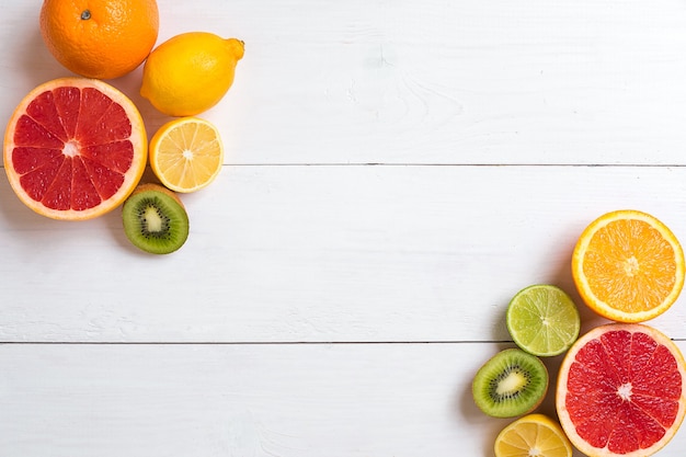 Various citrus fruits on the table top view