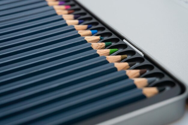 Various colored pencils on a white background