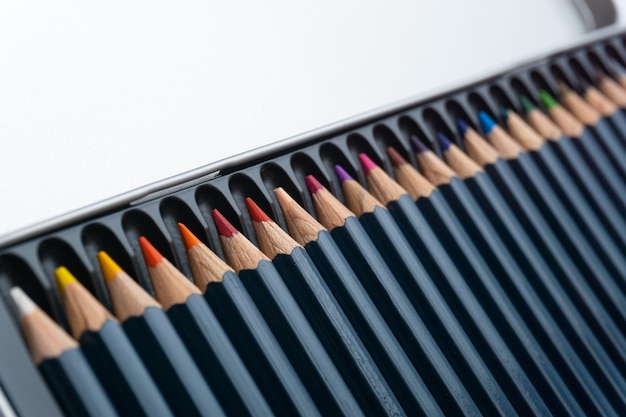 Various colored pencils on a white background