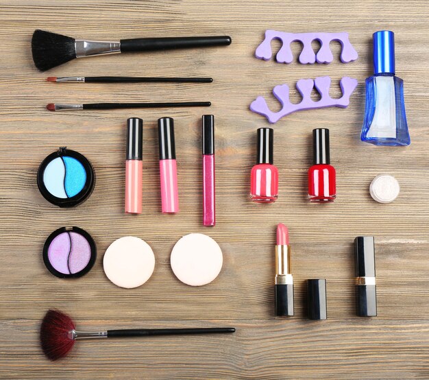 Various cosmetics on wooden background