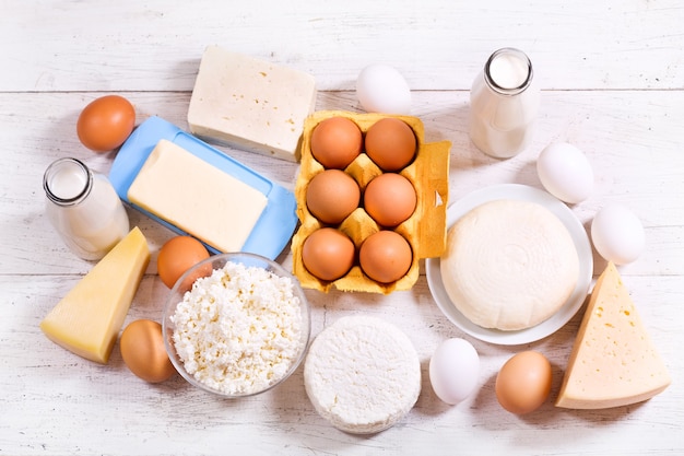 Various dairy products on wooden table