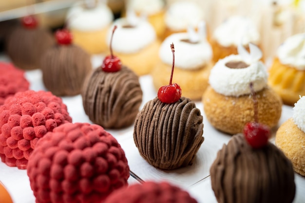 Various delicious sweet pastries in the shop window