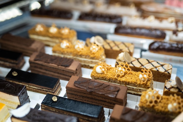 Various delicious sweet pastries in the shop window