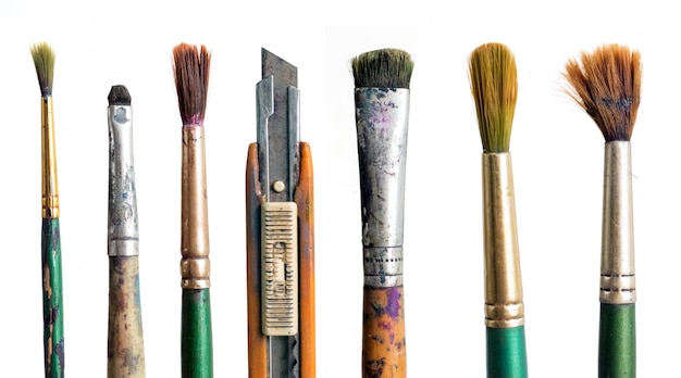 Various dirty paint brushes head and old cutter