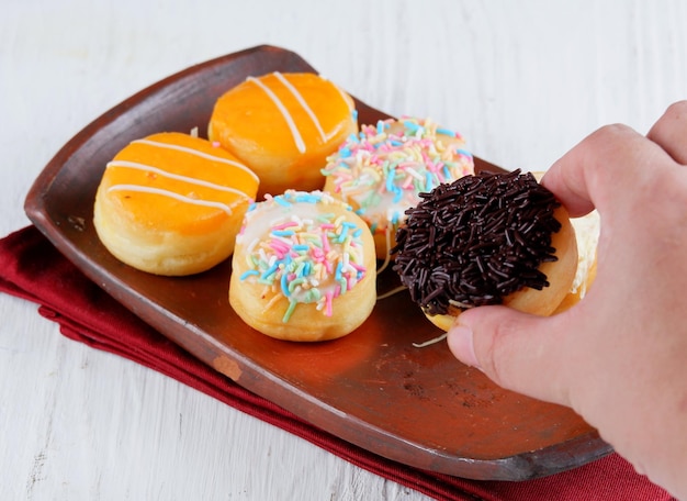 various donuts in plate