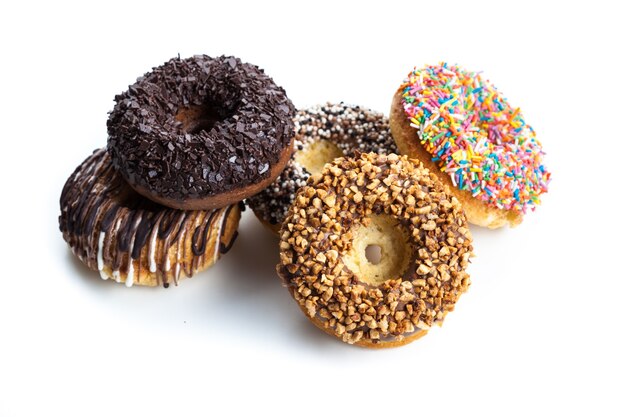 various donuts on white background